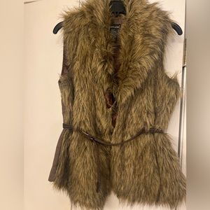 Waste length for vest with belt